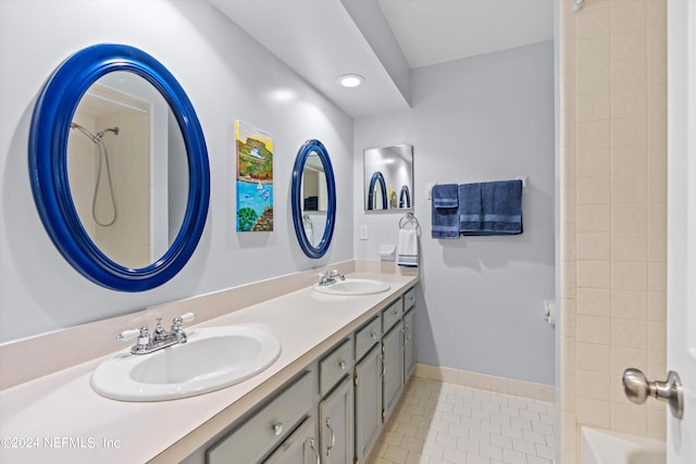 bathroom with vanity and tile patterned flooring