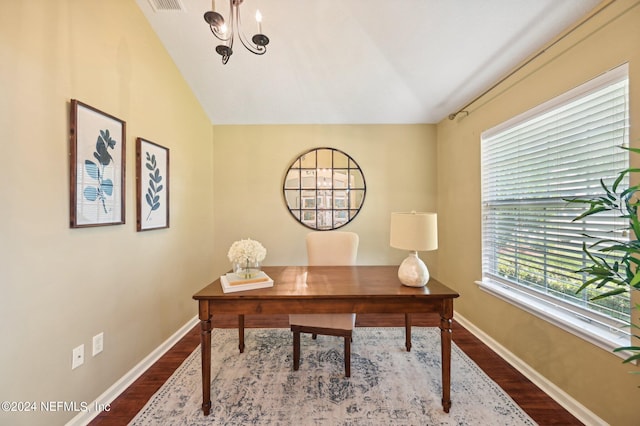 home office with wood-type flooring, a notable chandelier, and lofted ceiling