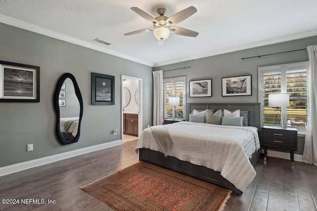 bedroom featuring connected bathroom, dark wood-type flooring, ornamental molding, a textured ceiling, and ceiling fan