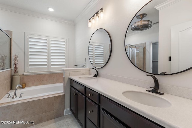 full bathroom with ornamental molding, a bath, and a sink
