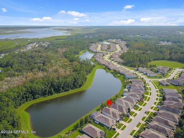 birds eye view of property with a residential view, a water view, and a forest view