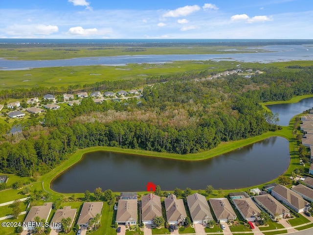 bird's eye view with a residential view and a water view