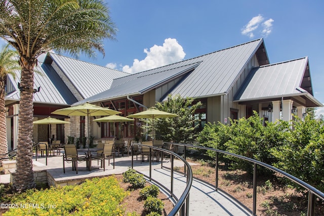 surrounding community with a patio area