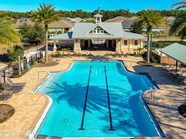 view of swimming pool with a patio