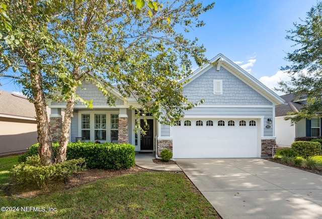 craftsman house with a garage