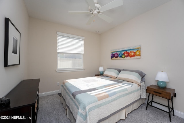 bedroom with ceiling fan and carpet floors