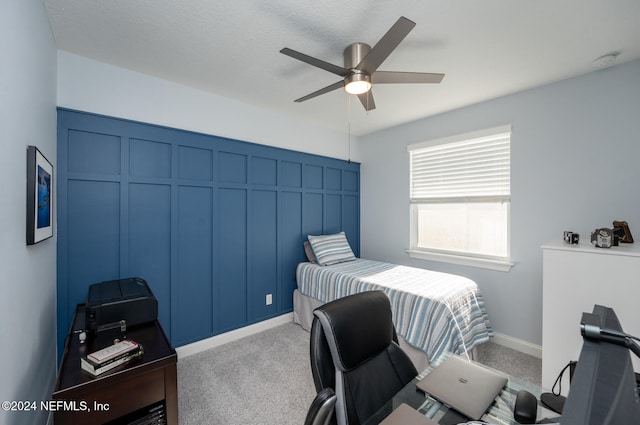 bedroom with light colored carpet and ceiling fan