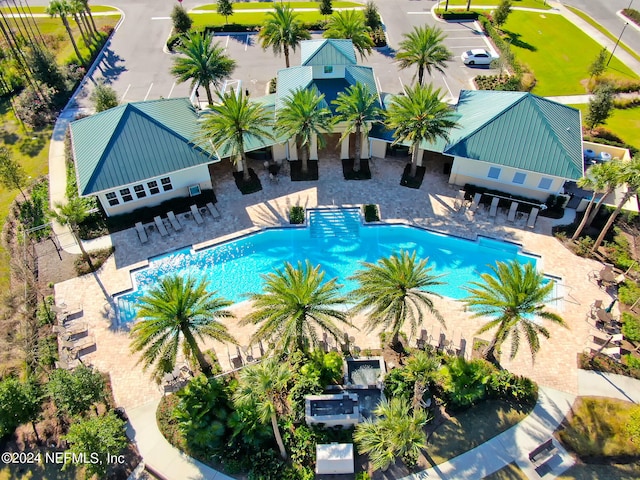 view of swimming pool featuring a patio