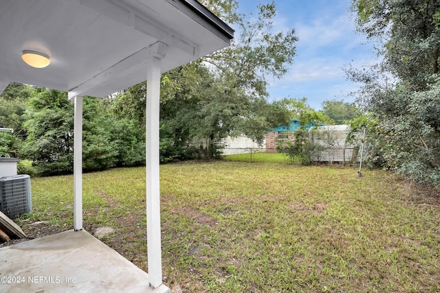 view of yard with central AC