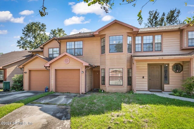 view of front of home with a front lawn