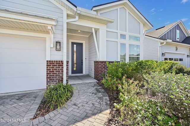 property entrance with a garage