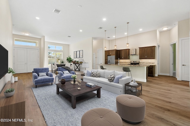 living room with light hardwood / wood-style floors