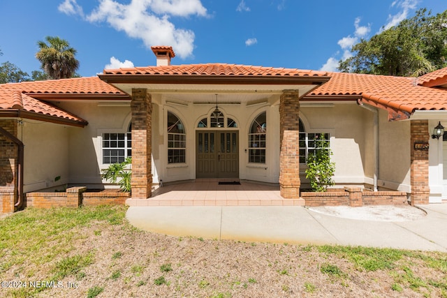 property entrance with a porch