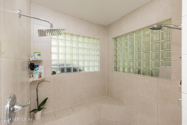 bathroom with tiled shower