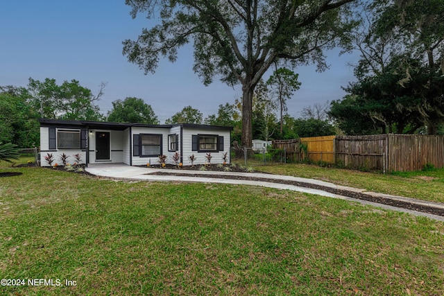 exterior space with a front yard