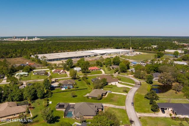 235 Crystal Cove Dr, Palatka, FL 32177 - bird's eye view with a wooded view and a residential view