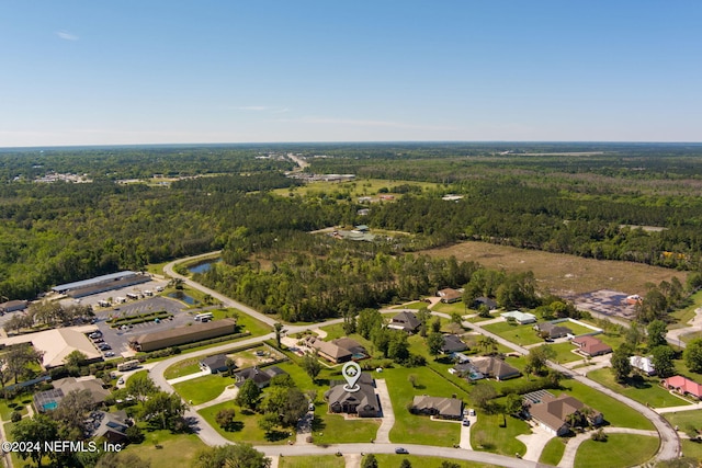 235 Crystal Cove Dr, Palatka, FL 32177 - drone / aerial view featuring a forest view