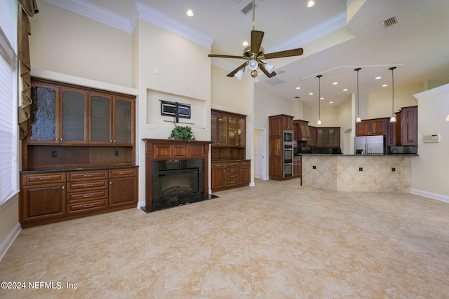 235 Crystal Cove Dr, Palatka, FL 32177 - unfurnished living room with baseboards, ornamental molding, ceiling fan, recessed lighting, and a towering ceiling