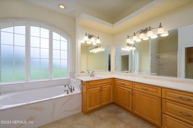 bathroom featuring vanity, plus walk in shower, and tile patterned floors