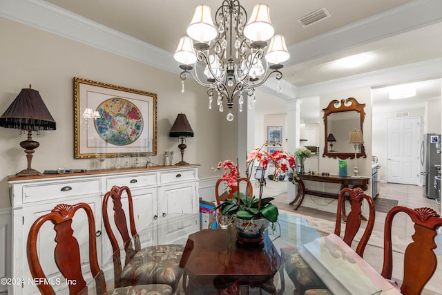 dining room featuring light tile patterned floors, an inviting chandelier, and ornamental molding