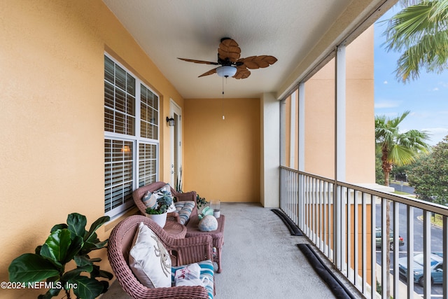 balcony featuring ceiling fan