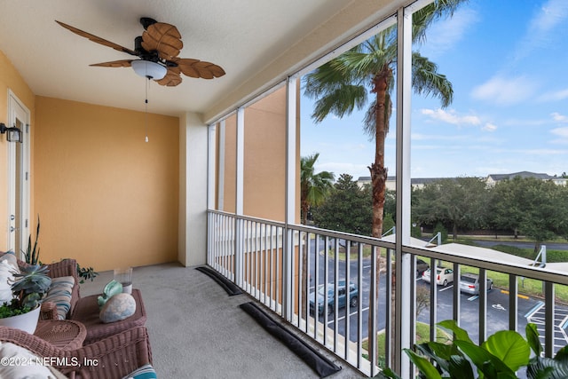 sunroom / solarium with ceiling fan