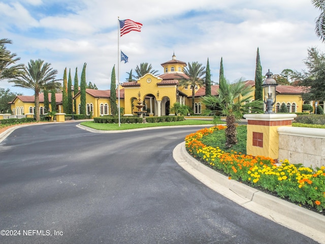 9831 Del Webb Pkwy Unit 2308, Jacksonville, FL 32256 - view of asphalt street with curbs and street lights