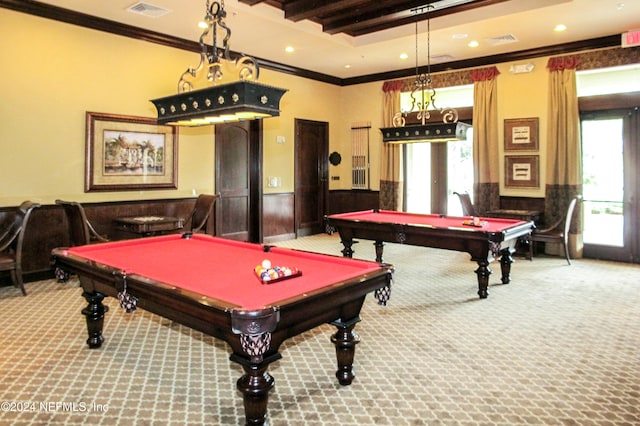 rec room featuring ornamental molding, beamed ceiling, carpet floors, and a healthy amount of sunlight