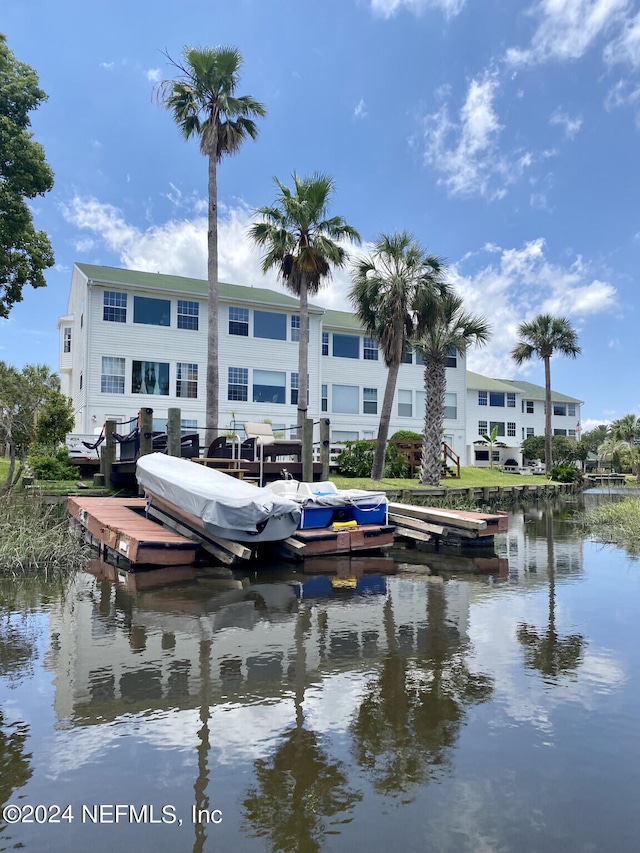 dock area featuring a water view