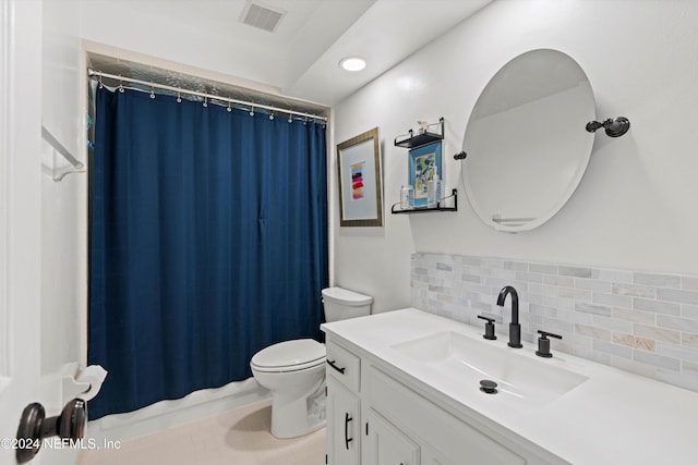 bathroom with vanity, toilet, curtained shower, and backsplash