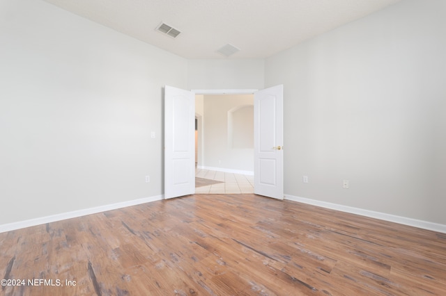 empty room with light wood-type flooring