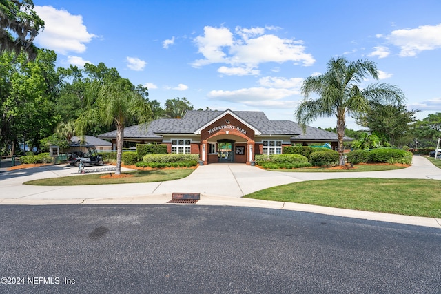 view of front of home with a front yard