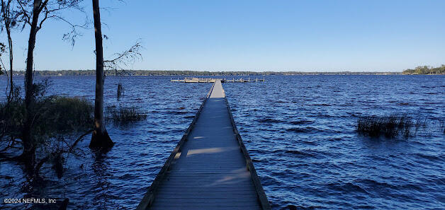 view of dock with a water view