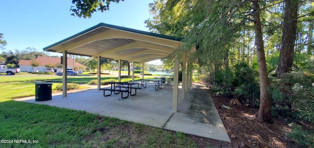 surrounding community featuring a lawn