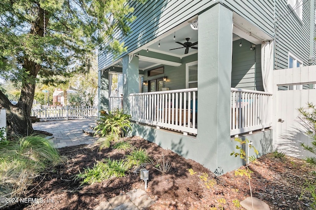 view of property exterior featuring ceiling fan