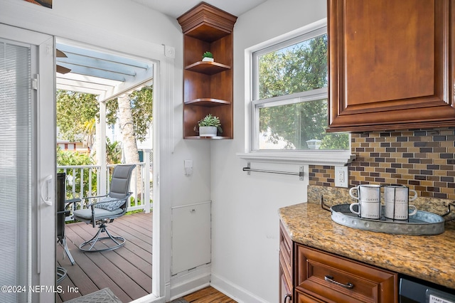 entryway with hardwood / wood-style floors