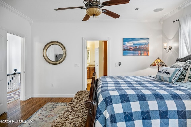 bedroom with dark wood-type flooring, ceiling fan, connected bathroom, and ornamental molding