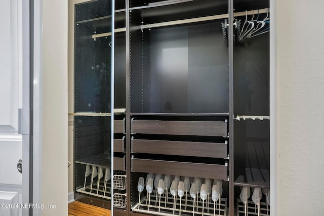 walk in closet featuring hardwood / wood-style floors