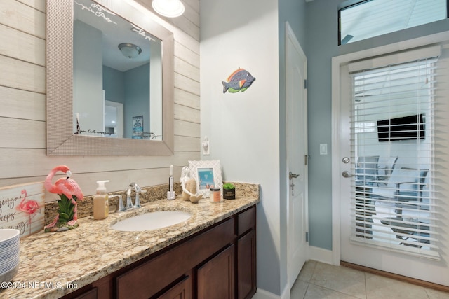 bathroom with vanity and tile patterned flooring