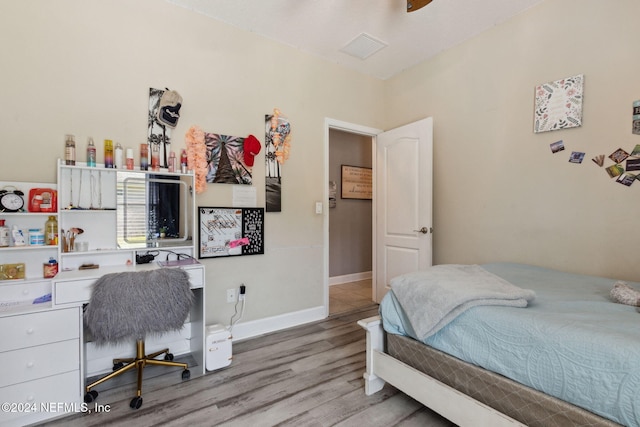 bedroom featuring hardwood / wood-style floors