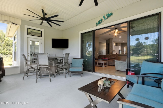 exterior space featuring ceiling fan