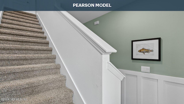 stairs with wainscoting