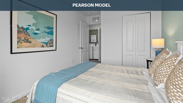 carpeted bedroom featuring washing machine and clothes dryer, a closet, and baseboards