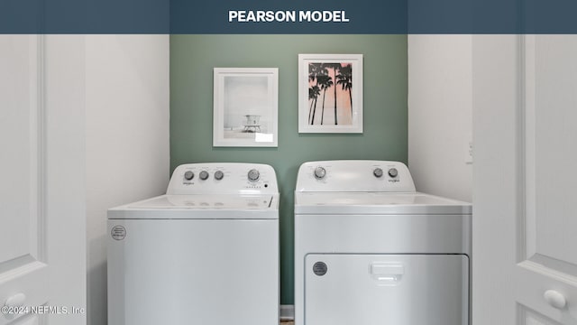 clothes washing area featuring washing machine and dryer