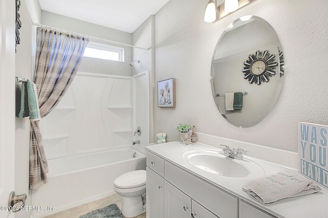 full bathroom featuring toilet, bathing tub / shower combination, tile patterned floors, and vanity