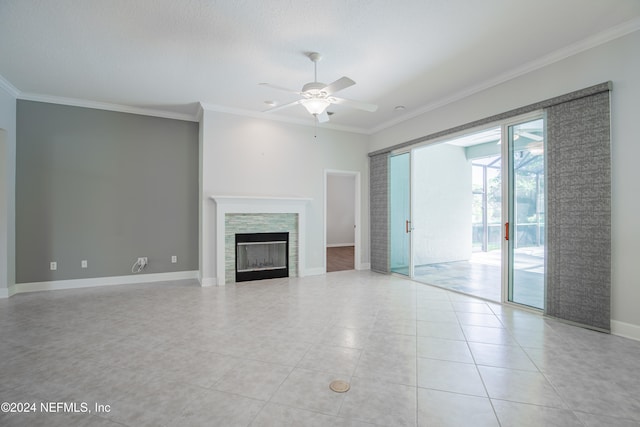 unfurnished living room with crown molding, ceiling fan, and light tile patterned floors