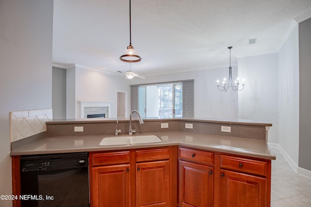 kitchen featuring sink, crown molding, hanging light fixtures, and dishwasher