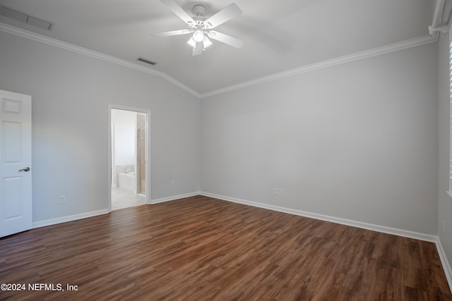 unfurnished room featuring crown molding, vaulted ceiling, dark wood-type flooring, and ceiling fan