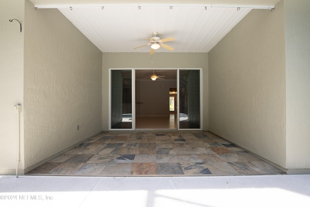 view of patio with ceiling fan