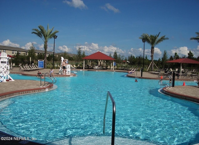 view of swimming pool with a gazebo